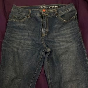 Blue jeans with a light spots of white line on the top